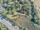 Scenic aerial view of a waterfront property featuring a private dock, lush greenery, and waterway access at 231 Bayview Dr, Mount Pleasant, SC 29464