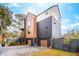 Contemporary style home featuring mixed materials with a two-car garage and modern staircase at 231 Bayview Dr, Mount Pleasant, SC 29464