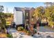 Impressive home boasting modern design, a private driveway, and meticulous landscaping at 231 Bayview Dr, Mount Pleasant, SC 29464