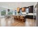Bright, open kitchen with a large island, pendant lighting, and modern dark cabinets at 231 Bayview Dr, Mount Pleasant, SC 29464