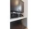 Convenient kitchen nook with overhead cabinets and white countertops at 231 Bayview Dr, Mount Pleasant, SC 29464