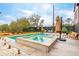 Backyard swimming pool and hot tub with lounge chairs at 231 Bayview Dr, Mount Pleasant, SC 29464