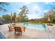 Backyard swimming pool with chairs and umbrellas near patio sitting area at 231 Bayview Dr, Mount Pleasant, SC 29464