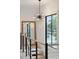 Staircase with modern railing and large windows offering abundant natural light at 231 Bayview Dr, Mount Pleasant, SC 29464