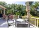 Spacious deck with dining and lounge seating, ideal for outdoor entertaining at 24 Beachwood West, Isle of Palms, SC 29451