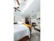 Bright bedroom with a fireplace, beach-themed art, and plenty of natural light at 24 Beachwood West, Isle of Palms, SC 29451