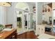 Kitchen flows to dining with doors to outdoor living, and a small beverage station with sink at 24 Beachwood West, Isle of Palms, SC 29451