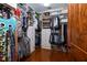 Organized walk-in closet with custom shelving, drawers, and ample storage space for clothing and accessories at 24 Beachwood West, Isle of Palms, SC 29451