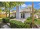 Private backyard featuring a deck, mature trees, and lush greenery at 2418 Castlereagh Rd, Charleston, SC 29414