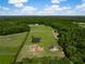 Sprawling property featuring a pond, large lot, mature trees and a house at 2470 Breakaway Trl, Johns Island, SC 29455