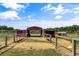 Well-maintained gated enclosure near barn with ample space for animals to roam freely in a rustic outdoor setting at 2470 Breakaway Trl, Johns Island, SC 29455