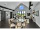 Bright and airy living room featuring a fireplace and large windows with backyard views at 2470 Breakaway Trl, Johns Island, SC 29455