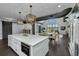Open-concept living space with a spacious island, dining area, and comfortable seating at 2470 Breakaway Trl, Johns Island, SC 29455