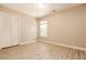 Bright bedroom featuring hardwood floors and a closet near the window at 258 Trickle Dr, Summerville, SC 29483