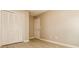 Bedroom featuring a closet near a closed door with light-colored walls and flooring at 258 Trickle Dr, Summerville, SC 29483