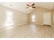 Bright, open living area with vaulted ceilings, neutral walls, and light wood-look flooring at 258 Trickle Dr, Summerville, SC 29483