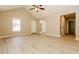 Bright, open living area with vaulted ceilings, neutral walls, and light wood-look flooring at 258 Trickle Dr, Summerville, SC 29483