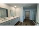 Bright bathroom with double vanity, stone countertop, and spacious walk-in shower at 265 Wild Strawberry Ln, Moncks Corner, SC 29461