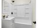 Bright bathroom featuring a white vanity and tub shower combo with black fixtures at 2678 Ranger Dr, North Charleston, SC 29405