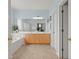 Bright bathroom with a double vanity, soaking tub, and walk-in shower at 2772 Latrobe Ct, Mount Pleasant, SC 29466