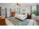 Bedroom featuring a ceiling fan, wooden furniture, and access to outdoor living space at 2772 Latrobe Ct, Mount Pleasant, SC 29466