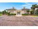 Clubhouse entryway with brick pavers and tropical landscaping at 2772 Latrobe Ct, Mount Pleasant, SC 29466