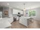 Bright kitchen with white cabinets, stainless steel appliances, and a center island at 2772 Latrobe Ct, Mount Pleasant, SC 29466
