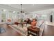 Comfortable living area with natural light, stylish furnishings, and an open connection to the modern kitchen at 2772 Latrobe Ct, Mount Pleasant, SC 29466