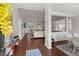 Bright and airy living room with hardwood floors, open floor plan, and view of the kitchen at 2772 Latrobe Ct, Mount Pleasant, SC 29466