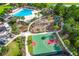 Aerial view of community pool, basketball court and playground with walking paths at 2772 Latrobe Ct, Mount Pleasant, SC 29466