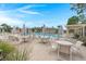 Community pool with ample seating and umbrellas overlooking the water, a great place to relax at 2772 Latrobe Ct, Mount Pleasant, SC 29466