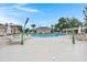 Community pool featuring a zero entry splashpad and lounge chairs under shaded pergolas at 2772 Latrobe Ct, Mount Pleasant, SC 29466