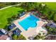 Aerial view of the large, rectangular community pool with lounge chairs and umbrellas on the spacious deck at 2772 Latrobe Ct, Mount Pleasant, SC 29466