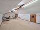 Large bonus room with desk and skylights at 2912 Doncaster Dr, Charleston, SC 29414