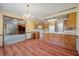 Open kitchen with updated appliances, ample counter space, and a breakfast bar open to staircase and living area at 2912 Doncaster Dr, Charleston, SC 29414