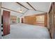 Spacious living room with vaulted ceilings, brick fireplace, hardwood floors and views of formal dining area and staircase at 2912 Doncaster Dr, Charleston, SC 29414