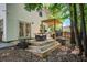 Inviting backyard deck with a pergola, perfect for outdoor dining and relaxation at 2916 Shadow Ln, North Charleston, SC 29406