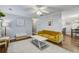 Bright and spacious living room featuring hardwood floors, a comfortable sofa, and stylish decor at 2916 Shadow Ln, North Charleston, SC 29406
