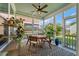 Screened porch with outdoor seating and views of the backyard at 3046 Sweetleaf Ln, Johns Island, SC 29455