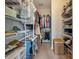Spacious walk-in closet with ample shelving and hanging space for organized storage at 3046 Sweetleaf Ln, Johns Island, SC 29455