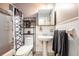 A bathroom with a tile shower, a toilet, and a sink at 308 Ashley Dr, Summerville, SC 29485