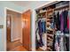 This walk-in closet is full of organized shelves and hanging clothes at 308 Ashley Dr, Summerville, SC 29485