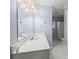 Bathroom featuring a white vanity with a quartz countertop and blue walls at 309 Padgett Loop, Walterboro, SC 29488