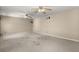 Large bonus room featuring carpet, natural light, and two ceiling fans at 309 Padgett Loop, Walterboro, SC 29488
