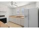 Traditional kitchen featuring white cabinets, butcher block countertops, a window, and white appliances at 309 Padgett Loop, Walterboro, SC 29488