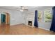 Cozy living room with hardwood floors, fireplace, and abundant natural light at 309 Padgett Loop, Walterboro, SC 29488