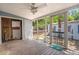 Screened porch with a ceiling fan and wood flooring at 309 Padgett Loop, Walterboro, SC 29488