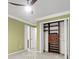 Bedroom featuring a ceiling fan and custom closet with shelving and drawers at 320 Compton Xing, Summerville, SC 29485