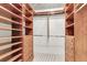 Walk-in closet with wood built-in shelving and drawer storage at 320 Compton Xing, Summerville, SC 29485
