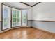 Bright, airy room with hardwood floors and large windows with white shutters at 320 Compton Xing, Summerville, SC 29485